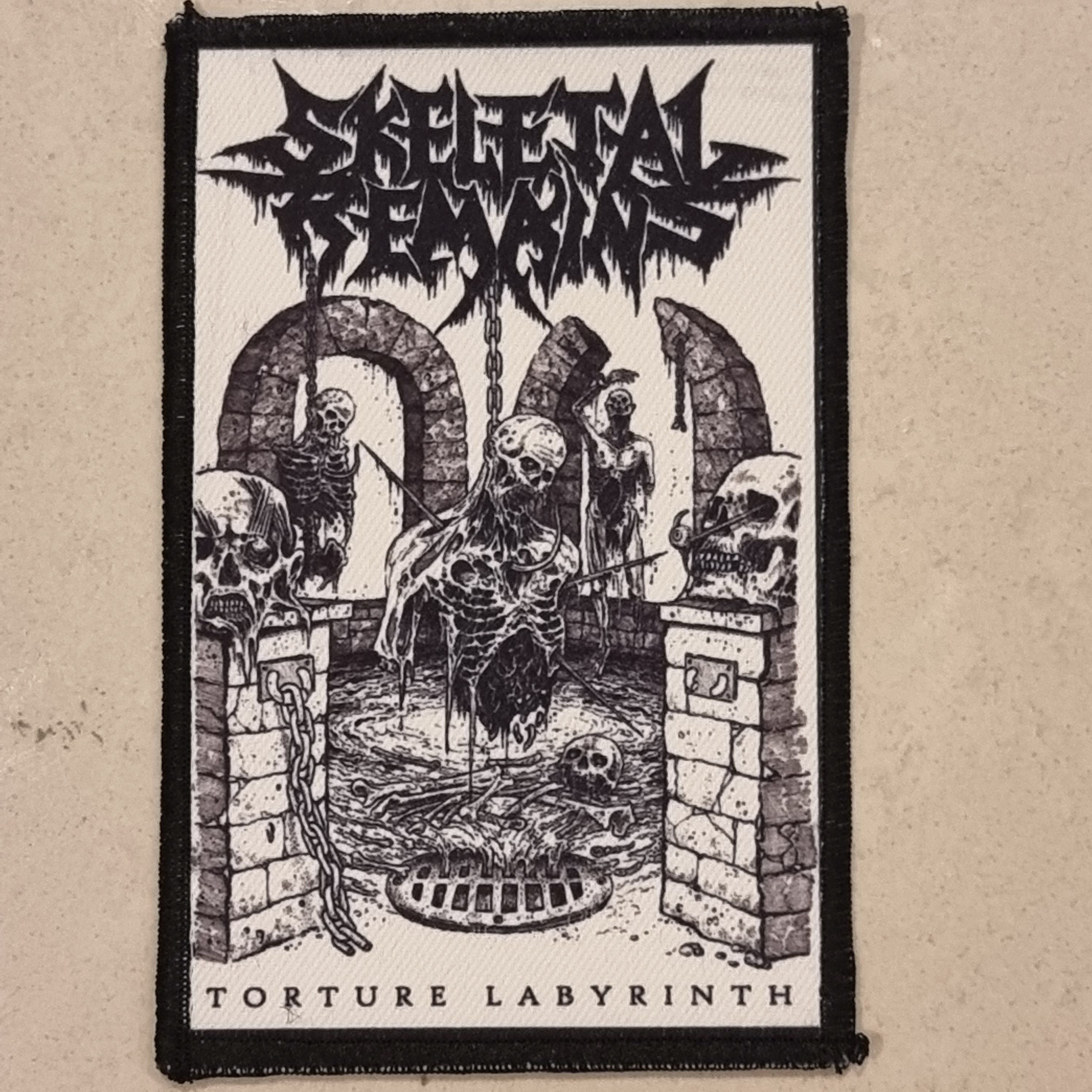 skeletal-remains-torture-labyrinth-patch-petit-logo-death image 1