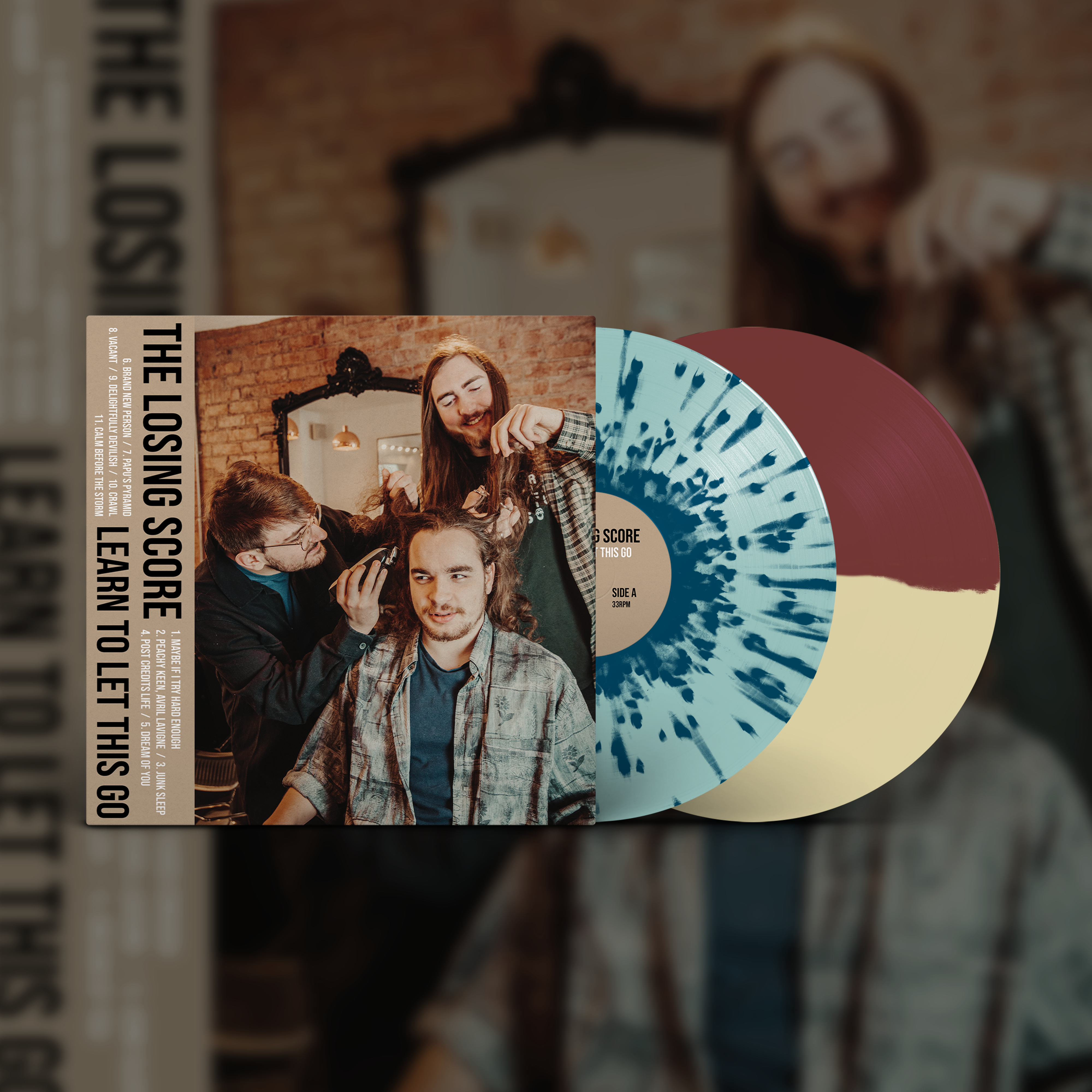 counter-intuitive-the-losing-score-learn-to-let-this-go-vinyle-bleu-splatter image 2