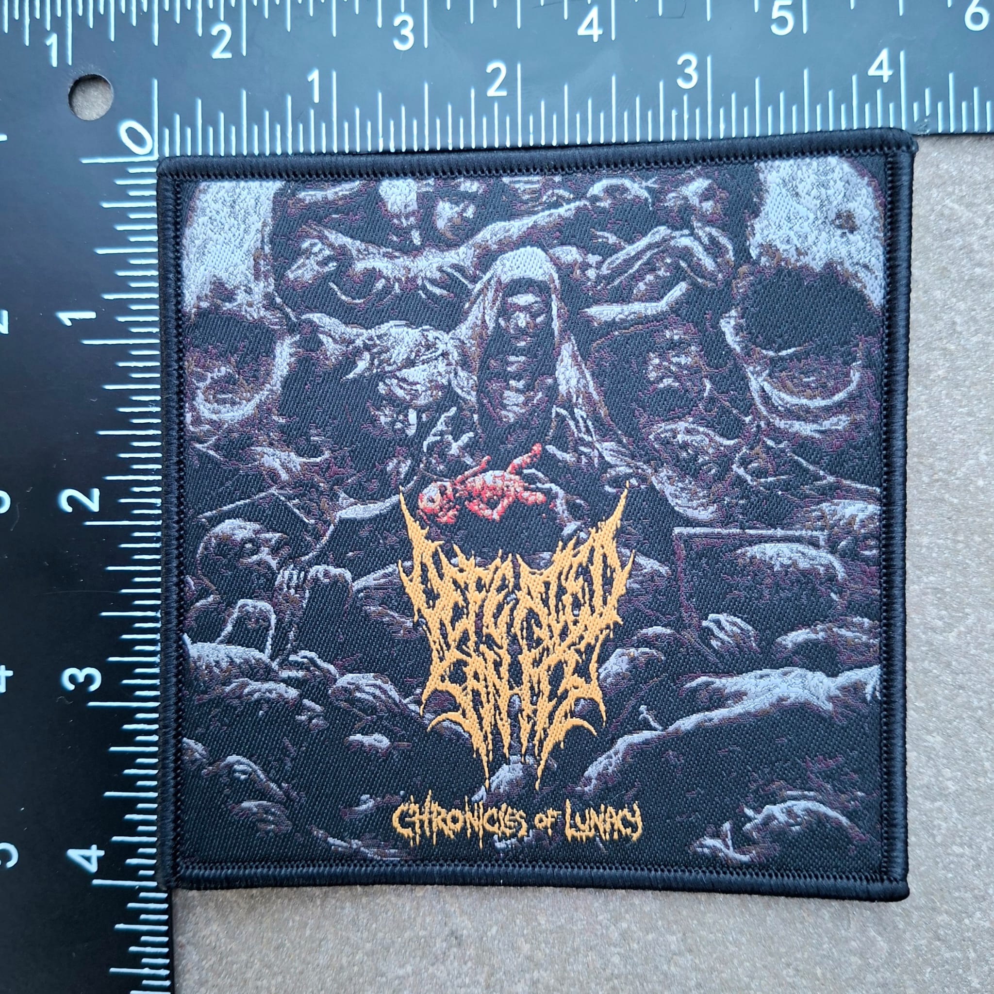 defeated-sanity-chronicles-of-lunacy-cusson-patch-tiss-bord-orange image 5