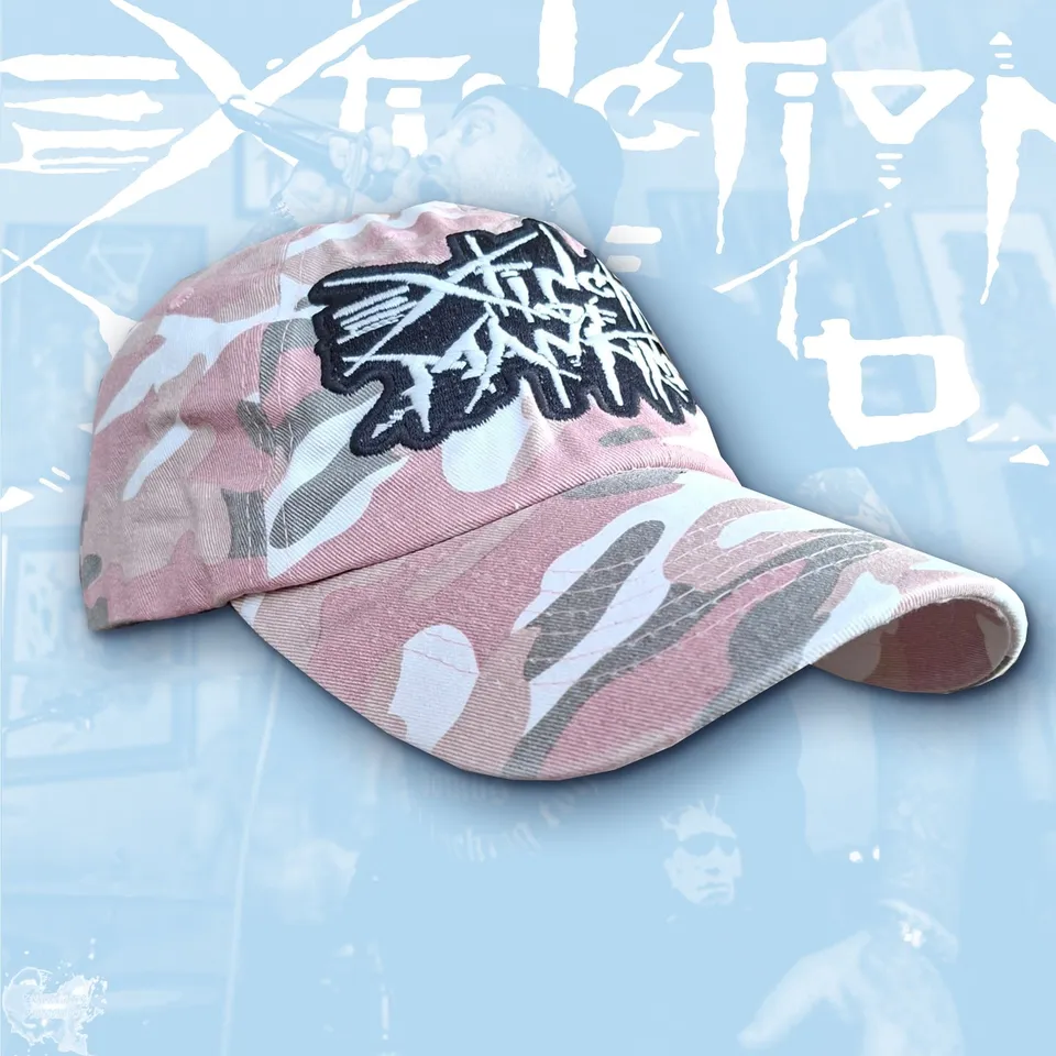 extinction-of-mankind-logo-casquette-camo-rose-phosphorescent image 1